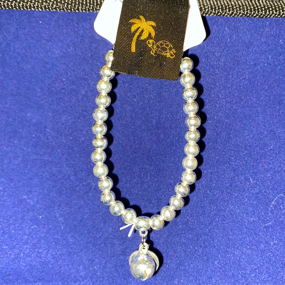 Silver beaded bracelet with sterling silver charm